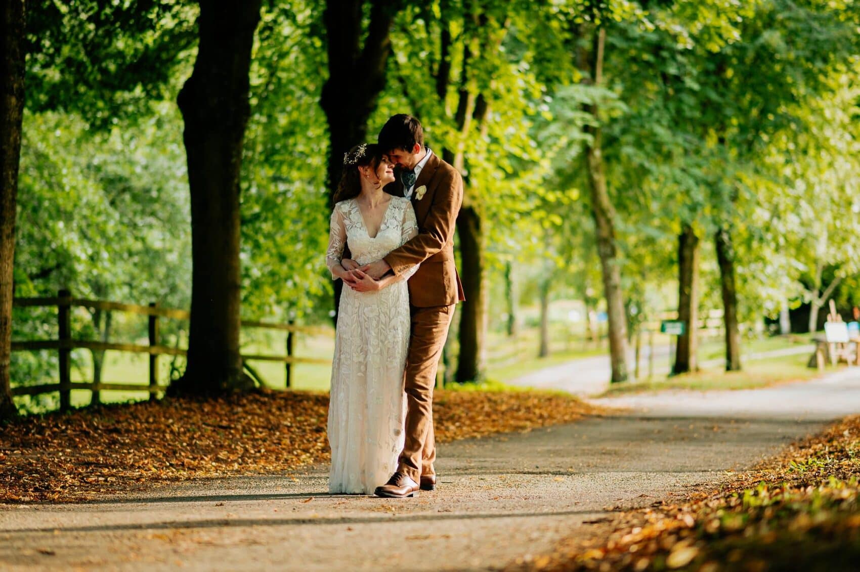 A quiet cuddle in the evening light at Owlpen Manor weddding