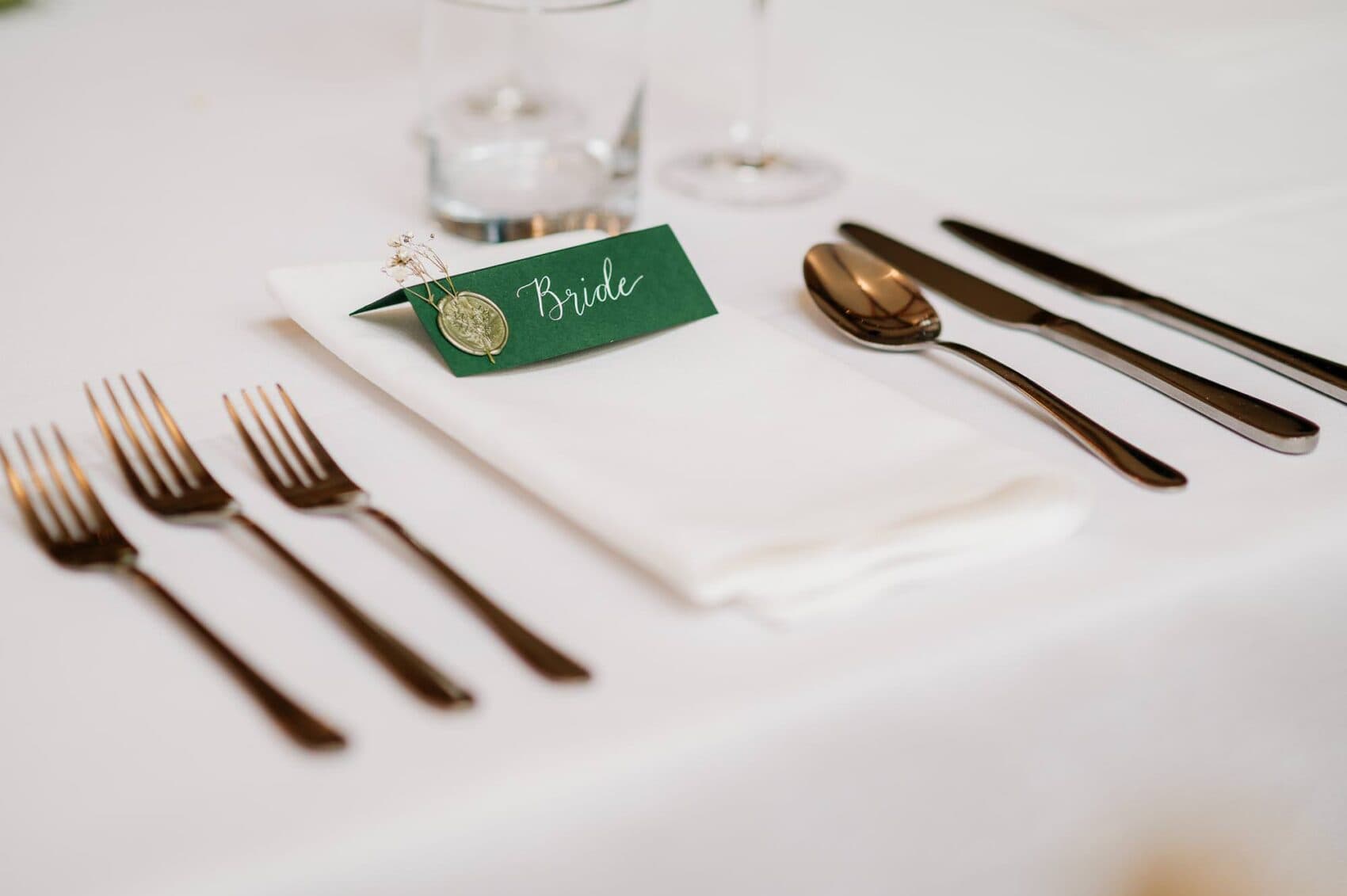 Brides place setting at her Owlpen Manor weddding