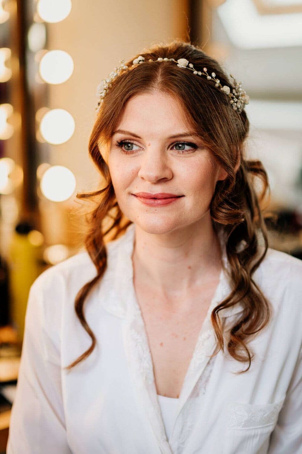 Bride after her hair and makeup finished at Owlpen Manor weddding