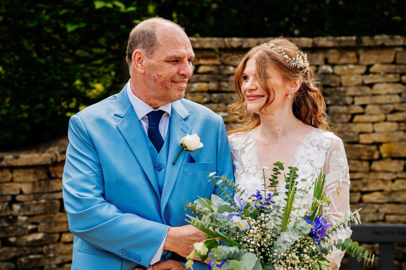 Last little look from dad before he gives her away at Owlpen Manor weddding