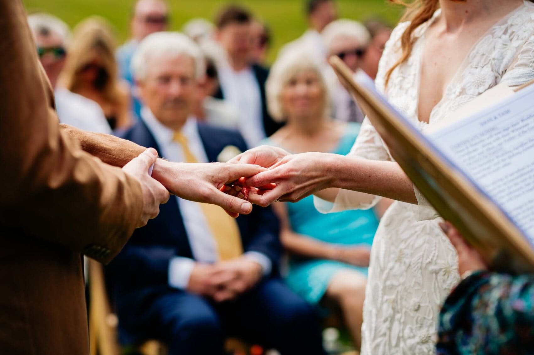 Close up of hands during the Owlpen Manor weddding