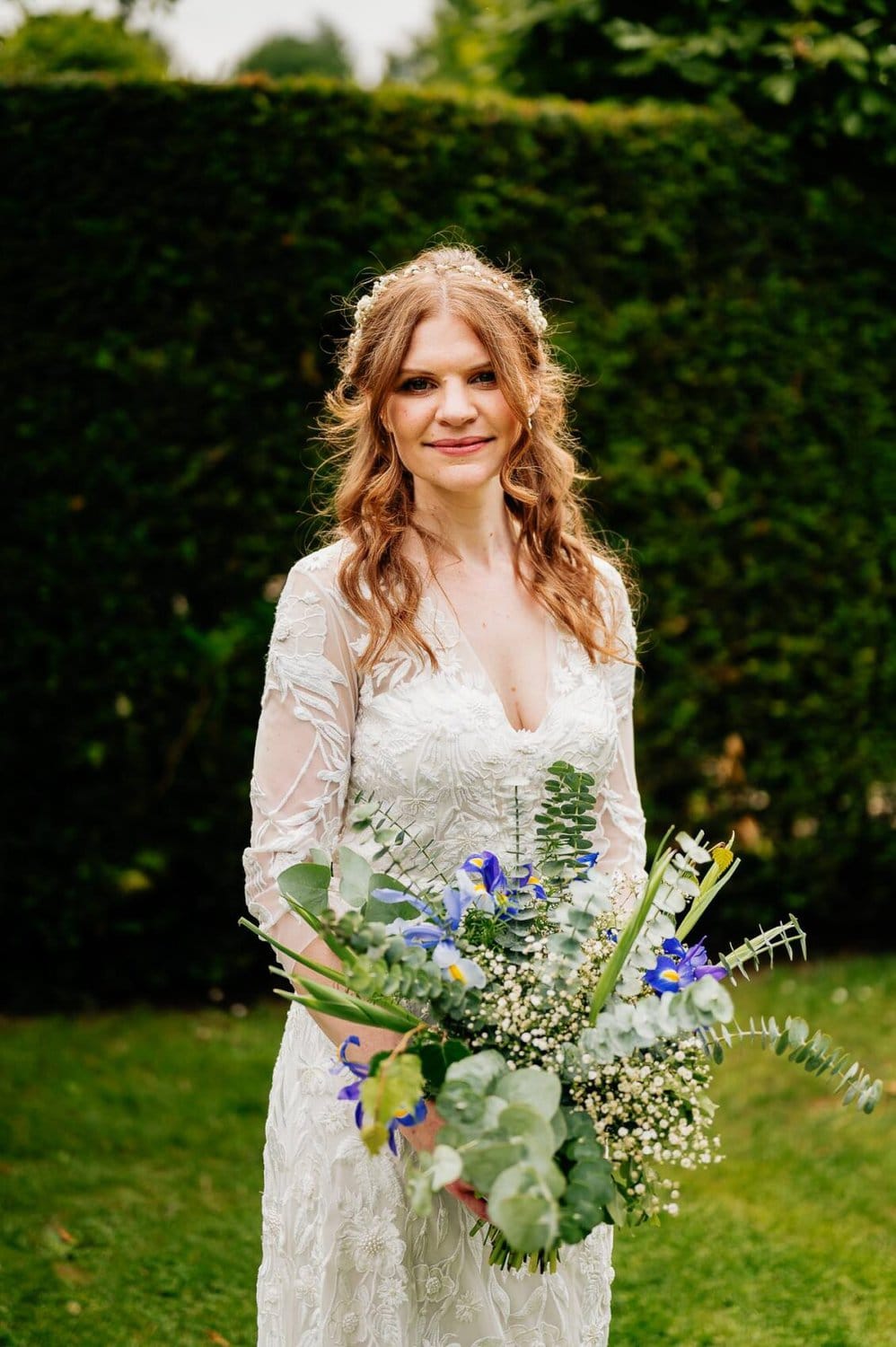 Bride in the garden of Owlpen Manor weddding