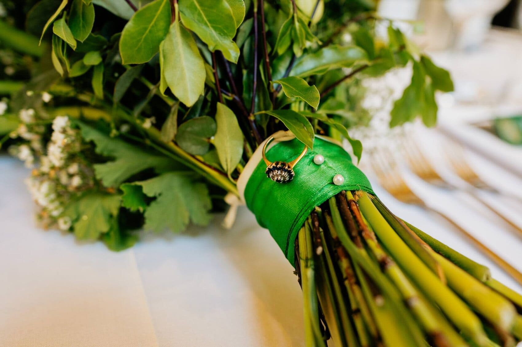 Mothers ring attached to the bouquet in memory