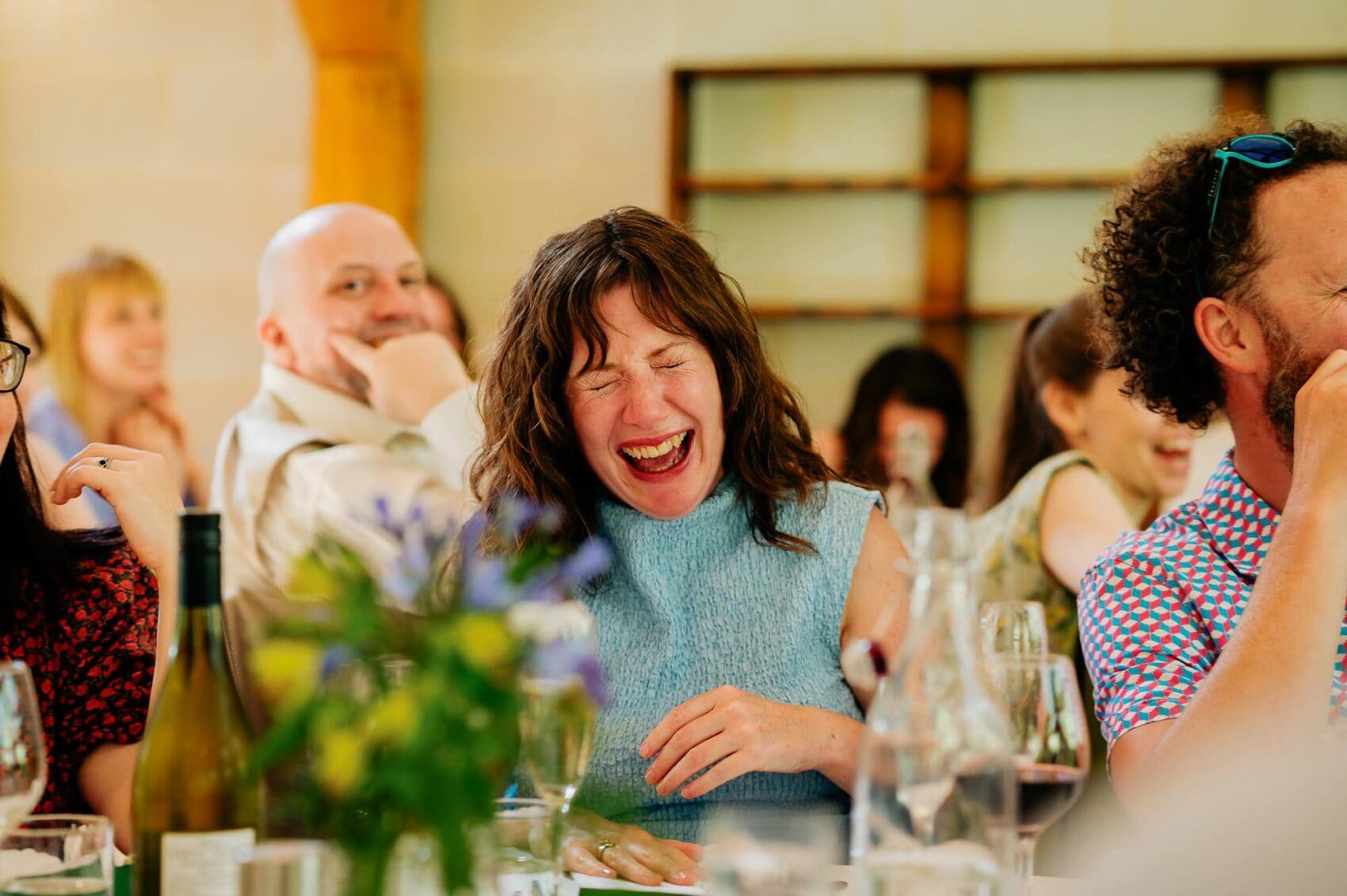 Guests laugh at the speeches