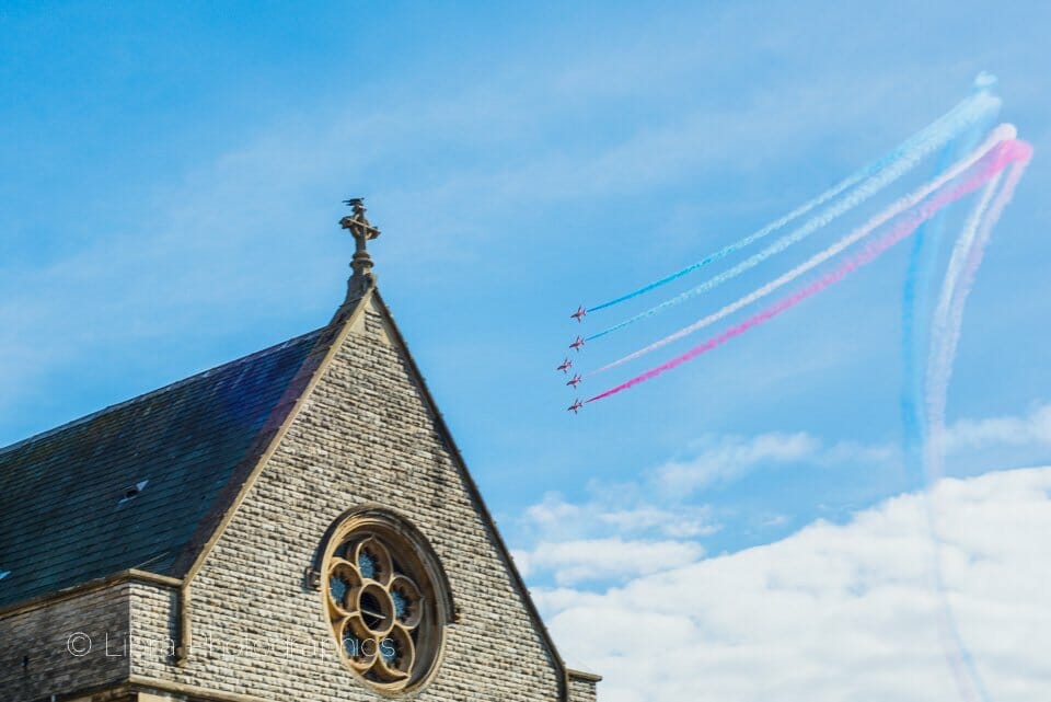 Red arrows fly over the Sacred Heart Church Bournemouth