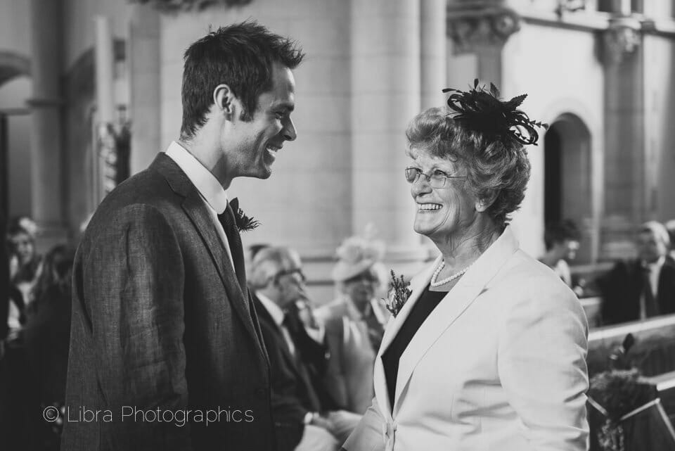 Groom laughs with his mum