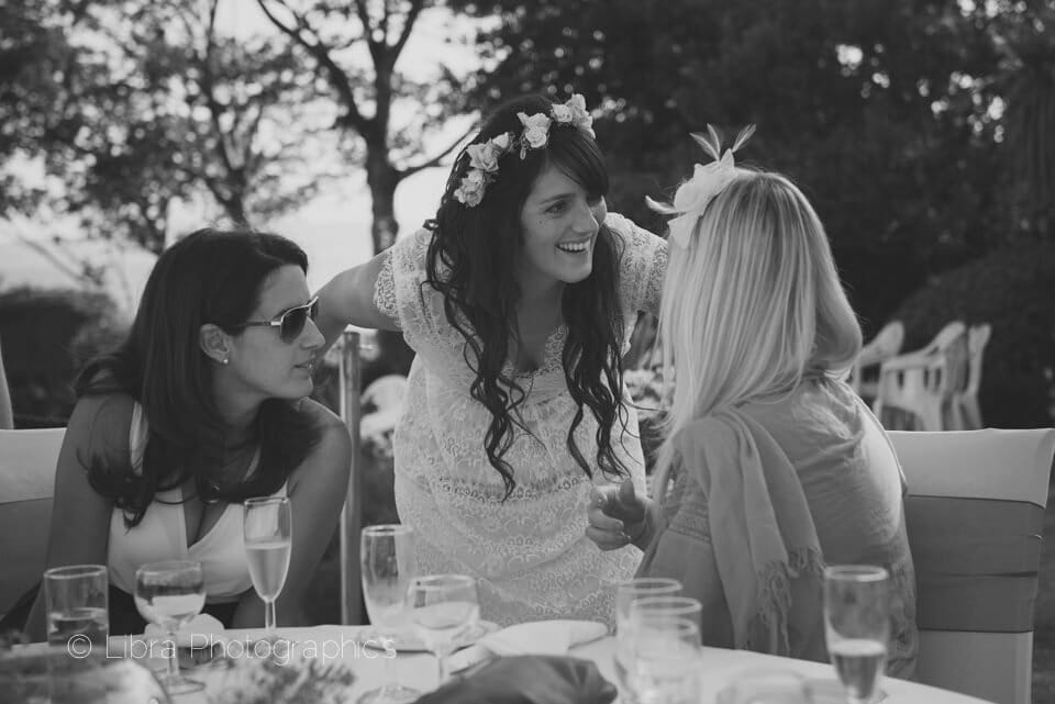 Boho Bride laughing with friends
