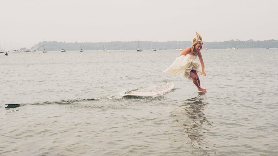 Bride jumping into water