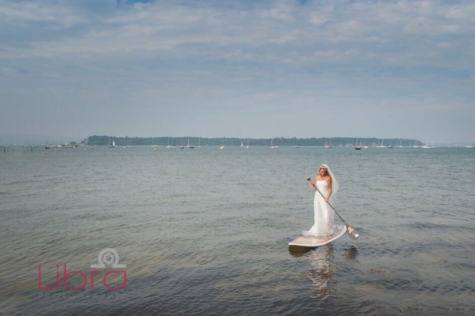 Bride on a SUP board in Poole